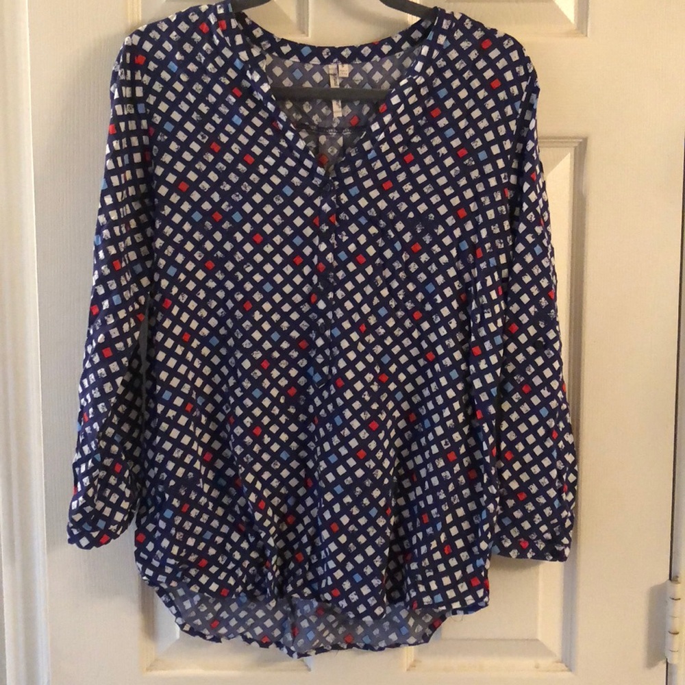 Red and blue patterned blouse